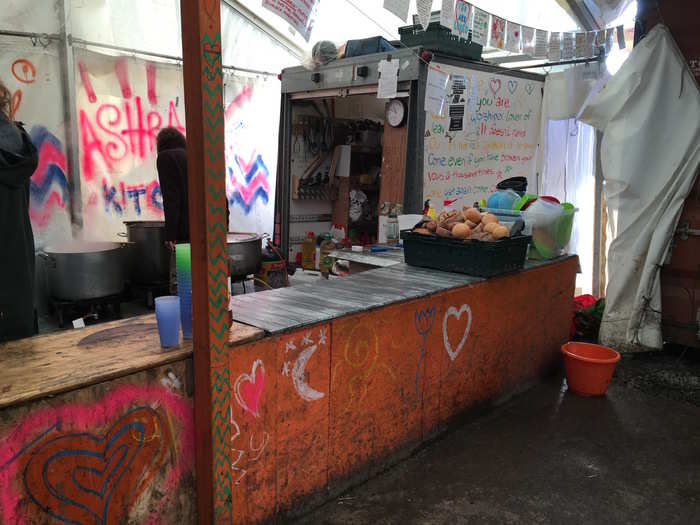 The inside of the Ashram communal kitchen where volunteers are cooking breakfast.