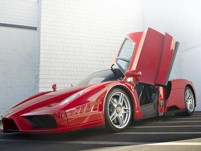 Ferrari adopted upswinging doors on its Enzo hypercar and ...