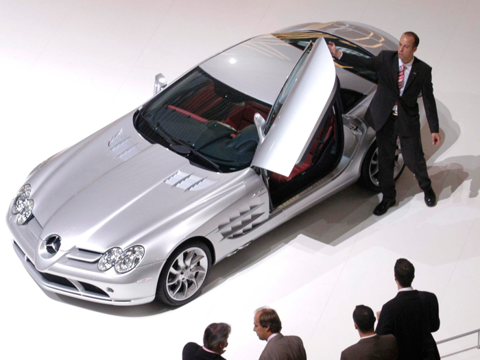 With the SLR, Mercedes and McLaren teamed up to make car with scissor doors.