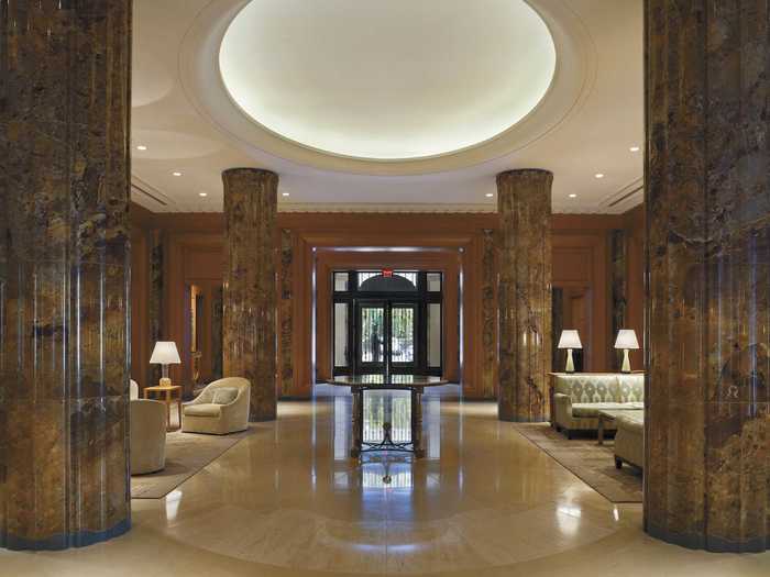 The facade of the building is completely covered in limestone, which costs millions of dollars more than brick. The lobby is also opulent, with English oak panels, fluted marble columns, and two fireplaces. There