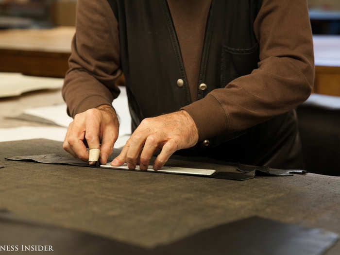 The cutting is extremely precise work, and new leather cutters must prove themselves by cutting hundreds of smaller pieces, gradually working their way up. They