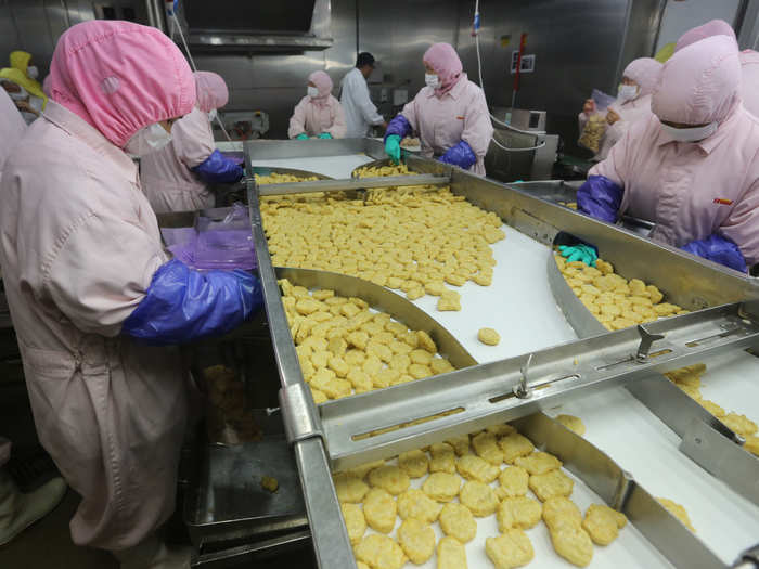 This image was taken days before the Shanghai Food and Drug Administration shut down this meat-processing factory in 2014.