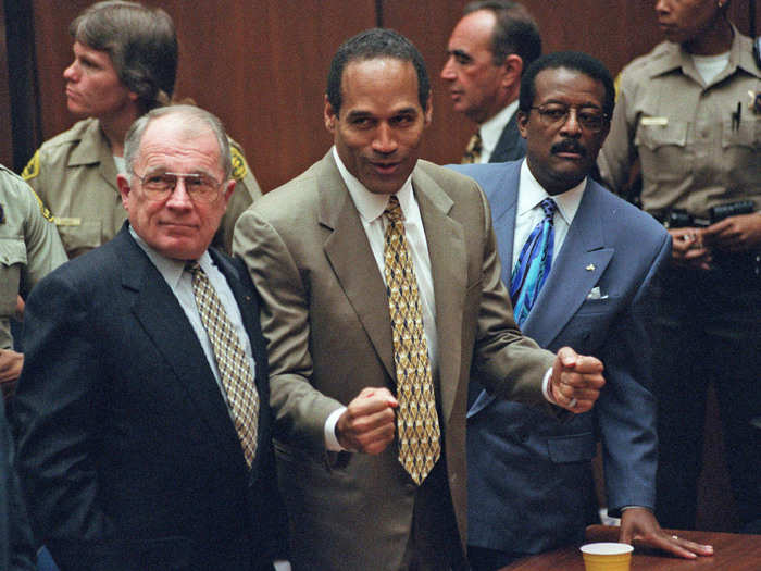 On October 3, 1995 the judge reads the not guilty verdict. Simpson and his lawyers cheer.