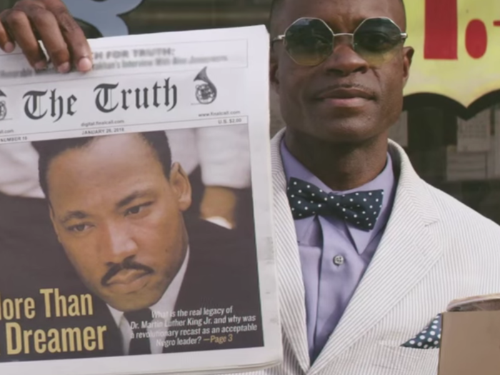 A newspaper shows Dr. Martin Luther King Jr. with the headline "More Than a Dreamer."