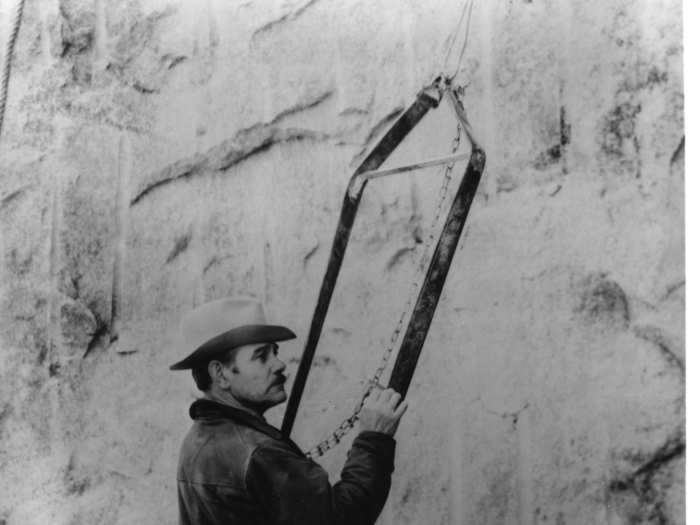 Workers throughout the carving process would routinely work from a bosun chair — a sling-like harness that was lowered from the top of the mountain on 3/8 inch thick steel cables.