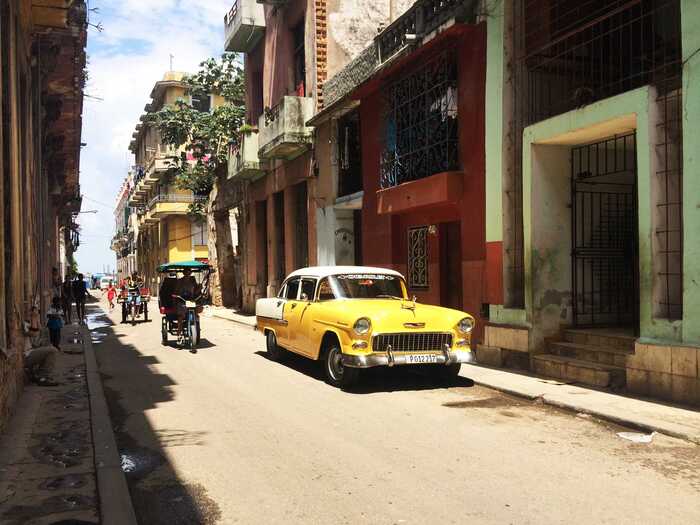 We slowly made our way through the streets of Habana Vieja, stopping every few minutes to take pictures of stunning classic cars ...