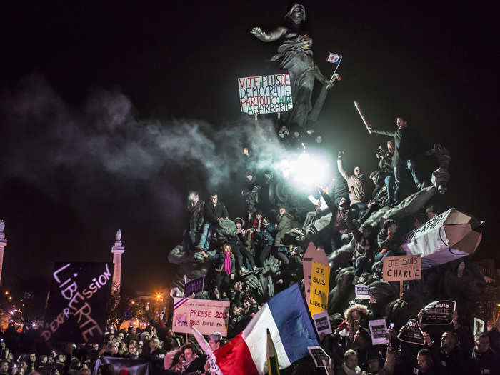 Spot News Singles, 2nd prize: Corentin Fohlen, France — 
Demonstration against terrorism in Paris, after a series of five attacks occurred across the I^le-de-France region, beginning at the headquarters for satirical newspaper Charlie Hebdo. Paris, France, 11 January 2015.