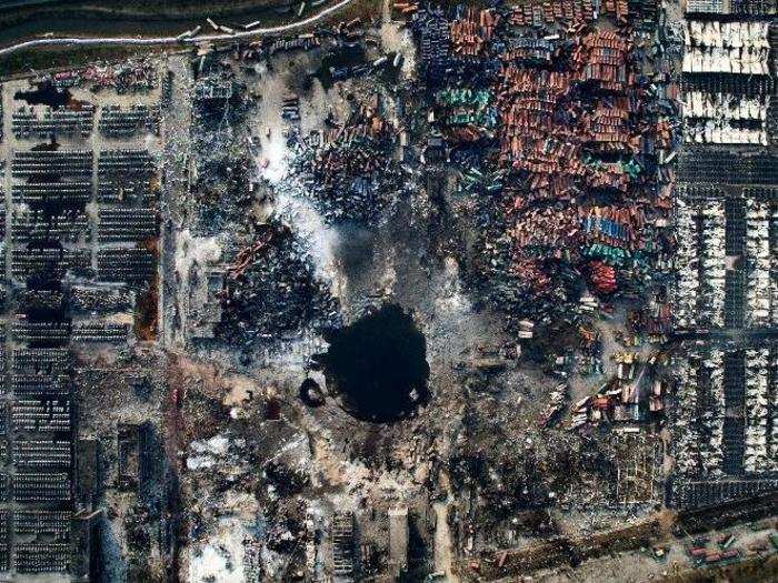 General News Singles, 3rd prize: Chen Jie, China — Aerial view of the destruction after the explosion in Tianjin, China, 15 August 2015.