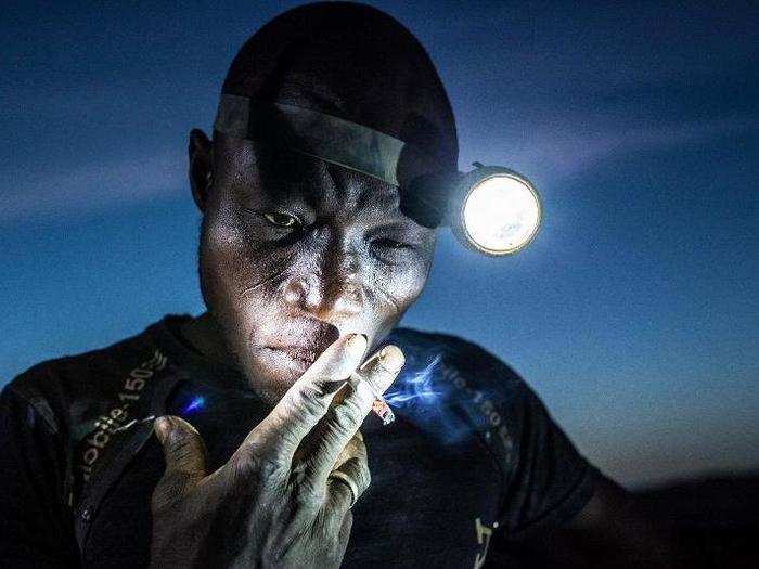 People Singles, 2nd prize: Matjaz Krivic, Slovenia — 
A mine worker takes a smoke break before going back into the pit. Miners in Bani face harsh conditions and exposure to toxic chemicals and heavy metals. Image taken in Bani, Burkina Faso, on 20 November 2015.