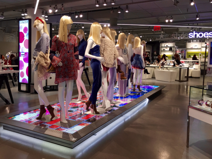 The chic, blonde mannequins are still perched on a simulated runway, dressed head-to-toe in upcoming spring fashion.