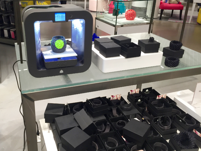 The 3D printer is still in the store. Previously, I was skeptical if this would interest millennials because it makes bulky jewelry. Now, it lets customers to create their own phone cases. As a millennial, I think customizable phone cases are a more accurate and impressive use of the 3D printer.