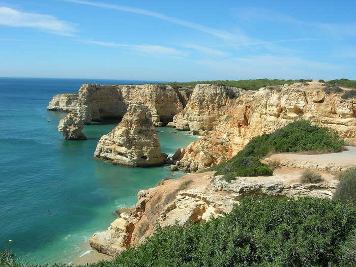 3. Praia de Marinha — Carvoeiro, Portugal: This Algarve beach is a geological marvel with "cliffs, rocks, caves, arches" and more.