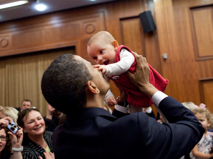 Obama greets one of his youngest fans in Prague in 2009.