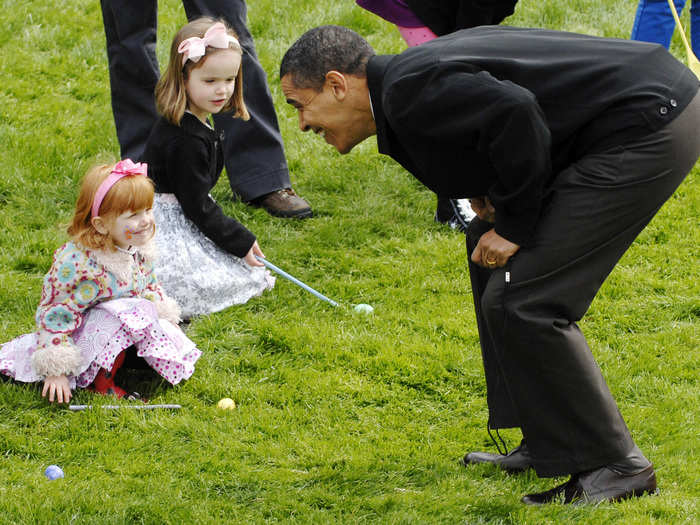 Three happy participants at the annual Easter Egg Roll on the White House