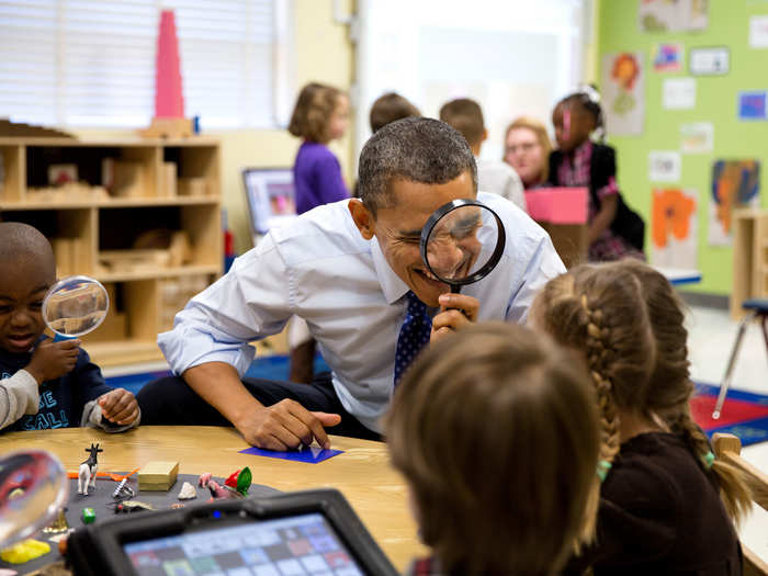 The president carefully inspects a classroom in Georgia.