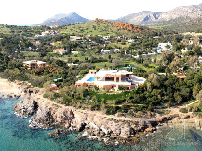 GREECE: At the southern tip of mainland Greece, in the town of Legrena, rests this 13-bedroom modern seaside villa. Fronting a rocky stretch of the Aegean, the massive estate is up for sale at $23 million.