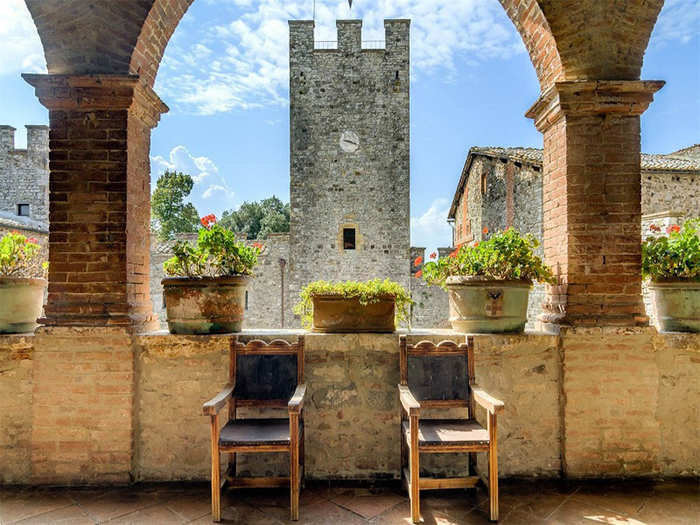 ITALY: If a medieval castle compound and winery is your dream, snatch up this $30.5 million property outside Siena. For that, you get almost 1,600 acres of countryside. The restored castle is surrounded by four swimming pools, 18 hectares of vineyards (all red varietals), olive groves, and plenty of space for livestock.