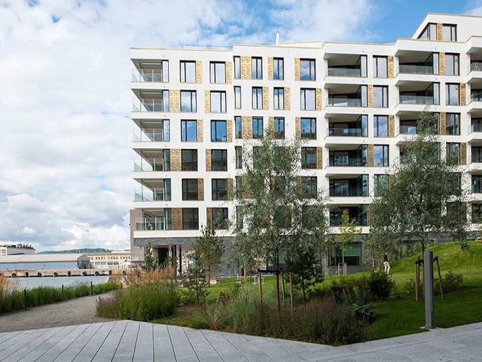 NORWAY: In a luxury apartment building in Oslo, you can snap up the top unit for a reasonable $5.7 million. The spacious contemporary condo has 3 bedrooms, panoramic water views, and 3 balconies — and promises natural light from morning to night, an important perk in the northern city.