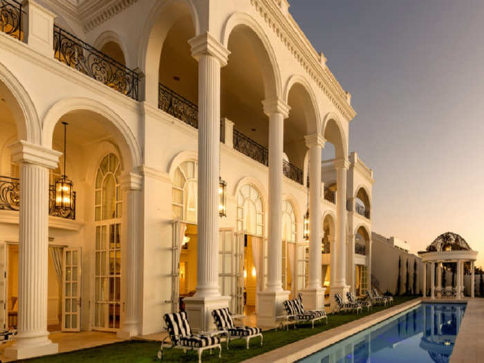 SOUTH AFRICA: A mansion built for a luxury car lover, this Cape Town estate with ocean views from every room boasts a 14-car garage with crown moldings and crystal chandeliers. The opulent eight-bedroom house also has a squash court, movie theater, fitness center, and ballroom. It