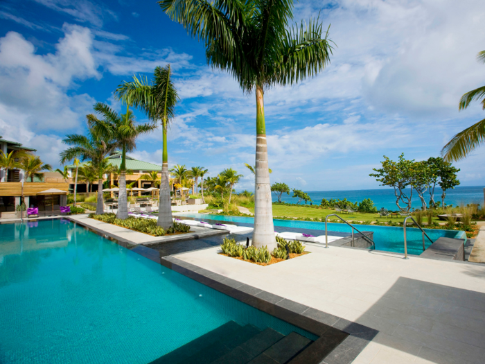 Tucked off the coast of Puerto Rico, the infinity pool at the W Retreat and Spa at Vieques Island has an underwater sound system that streams a custom mix through the water, while Puerto Rico and Culebra Island appear on the horizon.