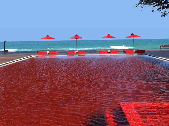 The pool at The Library in Koh Samui, Thailand, is lined with blood-red tiles to make for a stunning visual effect.