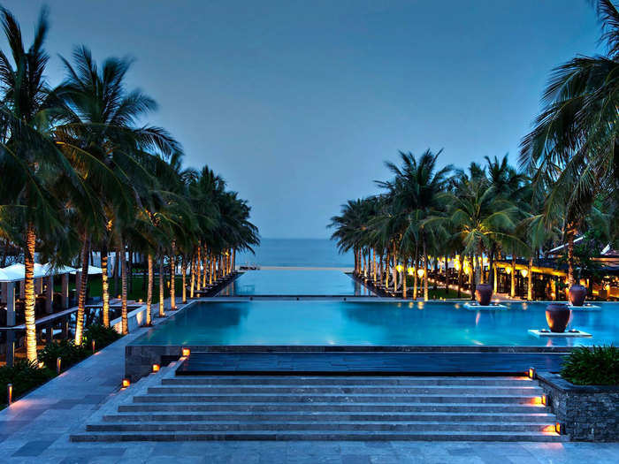 The gorgeous pool at The Nam Hai, in Vietnam, leads directly to the sands of the nearby beach.