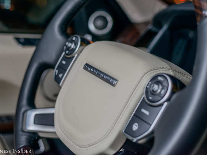 Drivers are treated to an elegant leather-and-wood-wrapped steering wheel.