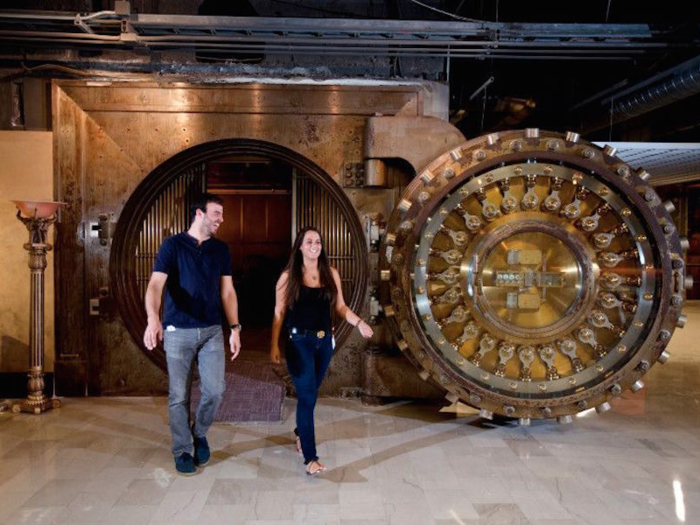 A repurposed bank vault serves as a meeting room at the Quicken Loans headquarters in Detroit.