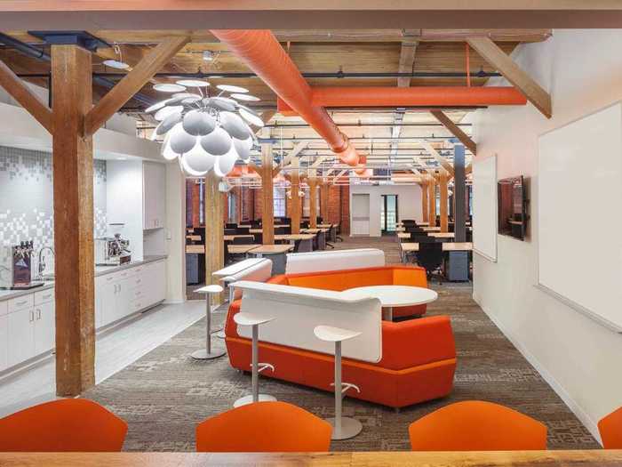 HubSpot, headquartered in Cambridge, Massachusetts, uses modern design to attract its employees to its colorful lounge area.