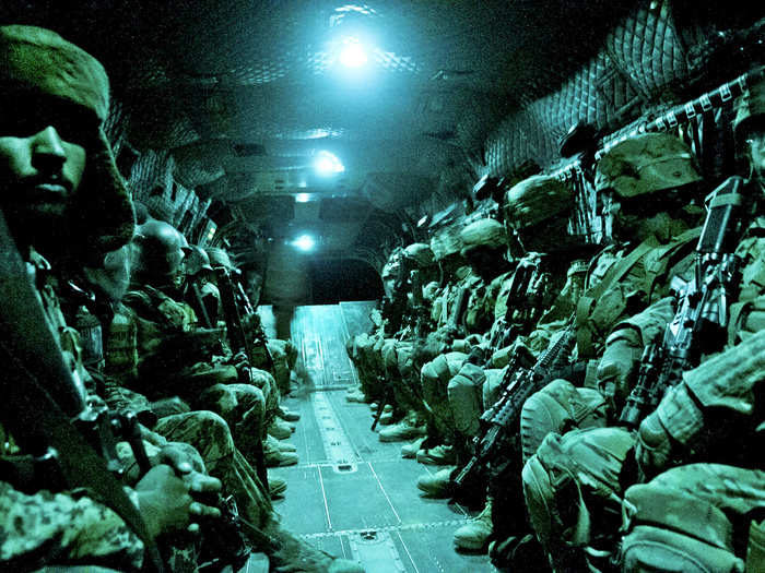 Paratroopers with the 82nd Airborne Division’s 1st Brigade Combat Team and Afghan National Army soldiers with 6th Kandak, 203rd Corps, travel aboard a CH-47 Chinook heavy lift helicopter during an air assault mission May 4, 2012, Ghazni Province, Afghanistan.