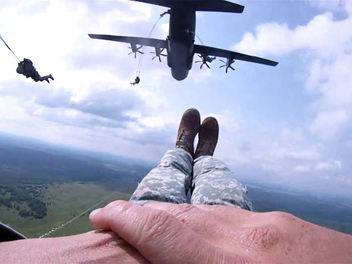 Staff Sgt. Travis Surber parachutes out of a C-130 Hercules Transport Aircraft and into the Ukraine sky.