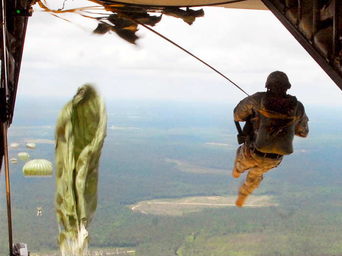 A US Army Soldier leaps from the ramp of a C-130 aircraft during an airborne operation on Fort Bragg, North Carolina.