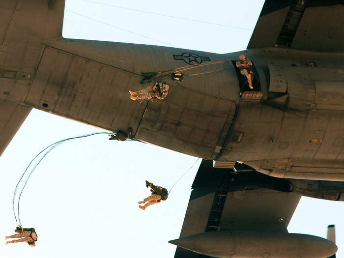 Paratroopers with 1st Brigade, 82nd Airborne Division (Advise and Assist), exit a C-130 over Iraq during a training exercise.