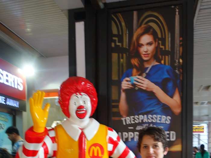 Ronald McDonald beckons us inside. He looks the same in India.