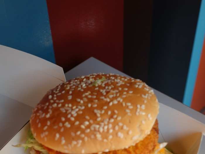 The massive burger is nearly the size of my head.