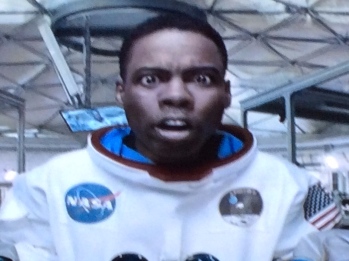 But Jeff Daniels and Kristen Wiig worry it may cost too much to bring the black astronaut back. And despite his pleas, they aren