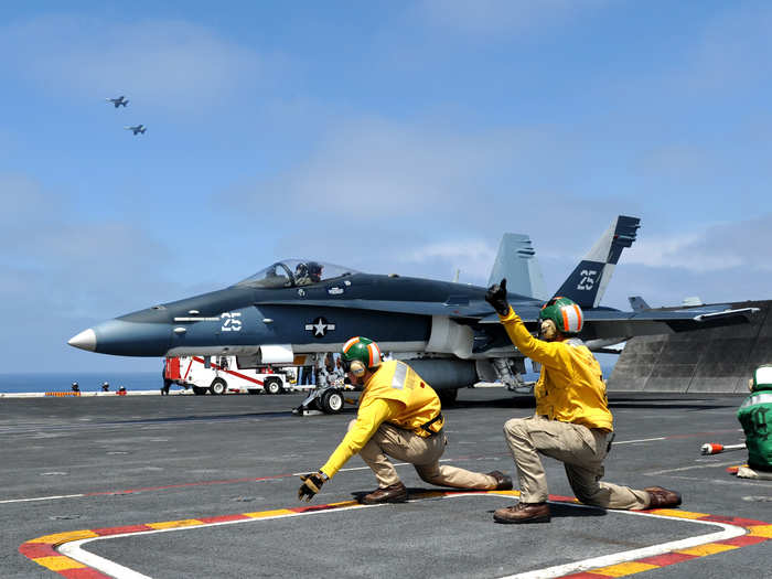 An aircraft prepares to launch from the aircraft carrier USS Nimitz.