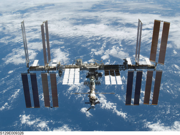 143,846,525 miles of total travel in the ISS. That