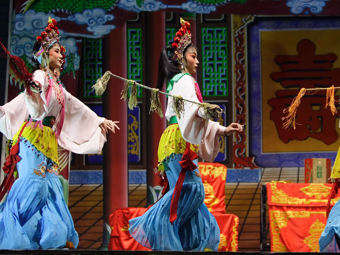 Performers at the Zhengyici Peking Opera Theatre showcase some of the best classical opera in the city. The well-preserved wooden theater has been host to some of the best in Peking opera for hundreds of years.