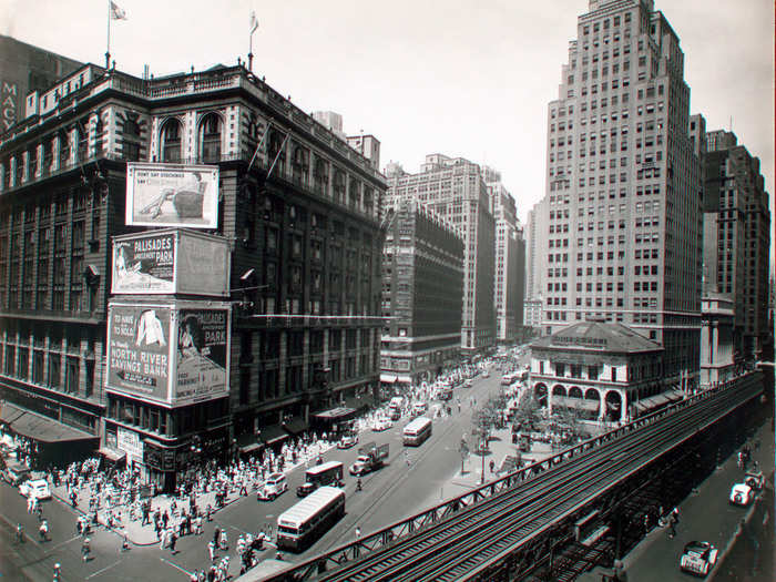 Herald Square was a hub for the newspaper industry, shopping, and subway lines in the 1930s. The elevated Sixth Avenue line, which you can see in this image, was built in the 1870s but demolished in 1939, just four years after this photo was taken. It was replaced by the underground subway.