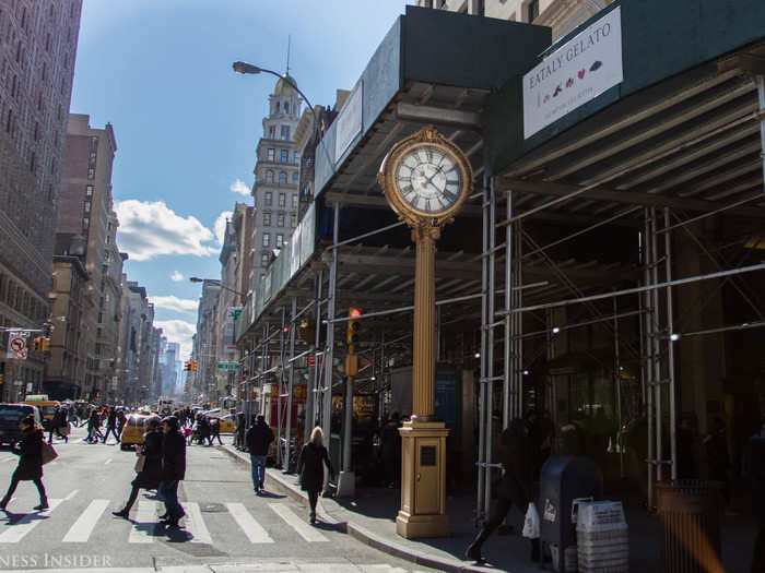 This gold street clock — located in front of the Fifth Avenue Hotel at Madison Square Park — still stands today, though the intersection seems just a little more busy.