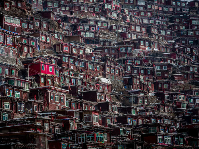 The Larung Gar Buddhist Academy in Sêrtar, China, is the biggest Buddhist settlement in the world, home to 40,000 monks and nuns.