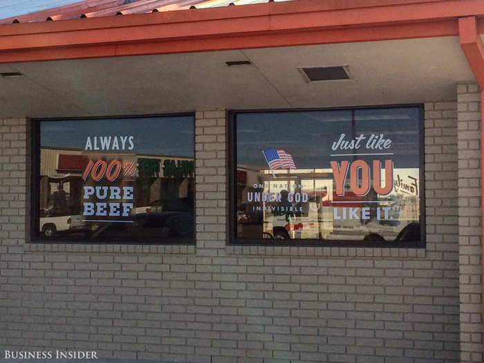 On the windows, decals proudly proclaim their burgers to be 100% beef, ordered just the way you like it. Also, a dash of patriotism for good measure, apparently — what