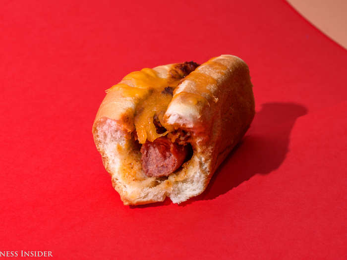 This hot dog tastes like dried sausage — and that taste overpowers the skimpy amount of chili and cheese on the hot dog. The meat is really tough and it