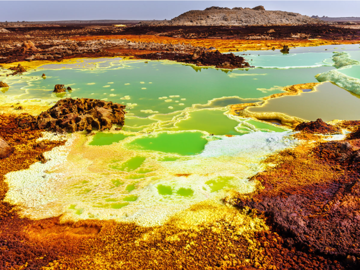 The Danakil Depression, in the northeastern corner of Ethiopia, is one of the hottest places on the planet, with temperatures reaching as high as 145 degrees Fahrenheit. With two active volcanoes, a bubbling lava lake, geysers, acid ponds, and several mineral deposits, the setting looks like something from another planet.