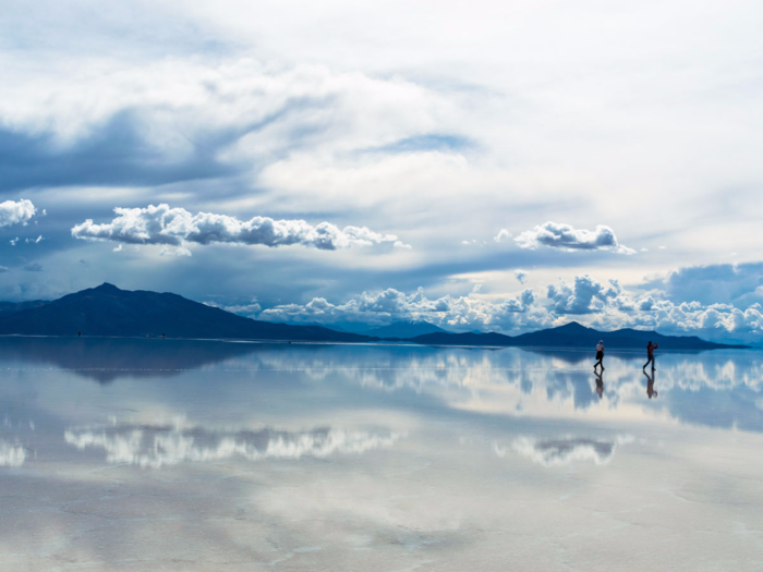 During the wet season, the Salar de Uyuni salt flats in Bolivia are covered in a thin layer of water, creating surreal reflections of the sky.