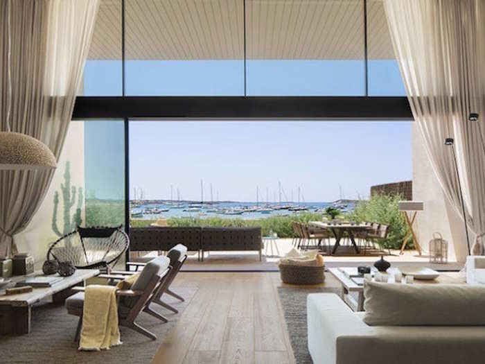 The Stunning and Modern Seafront Villa in Colonia de Saint Jordi, Spain, looks out onto the Mediterranean sea.