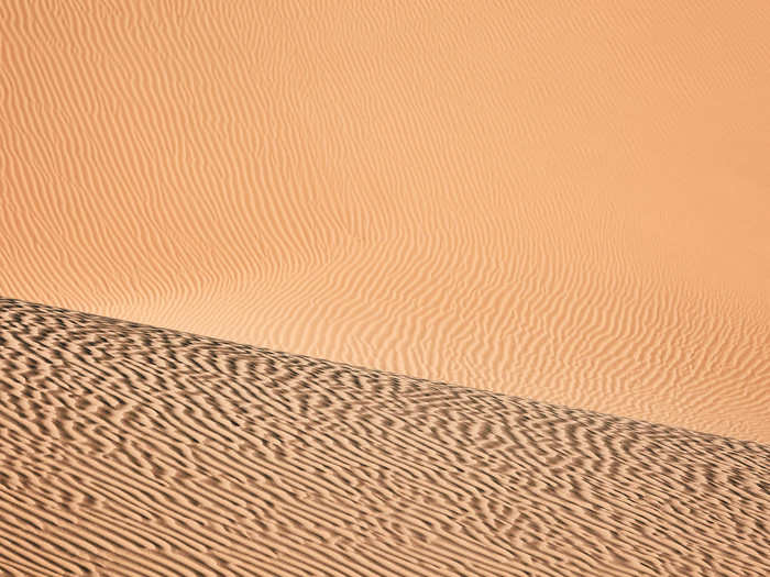 The wind that blows through Rig-e Jenn is forceful, creating these shapes and textures in the sand.