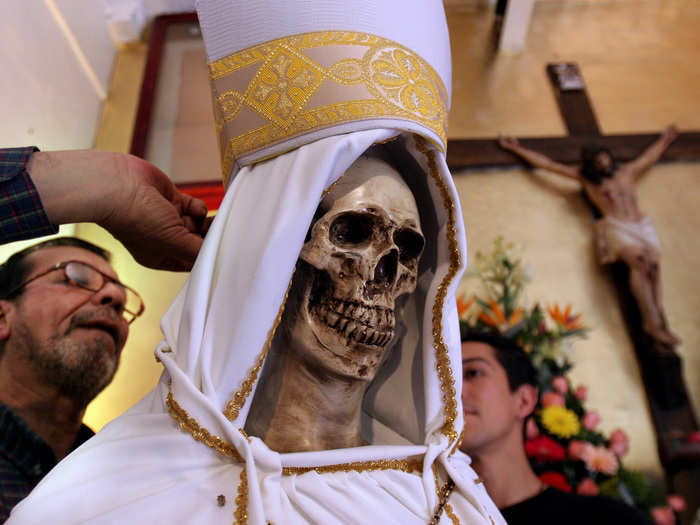 For many in Mexico, their Catholic faith and devotion to Santa Muerte can coexist.