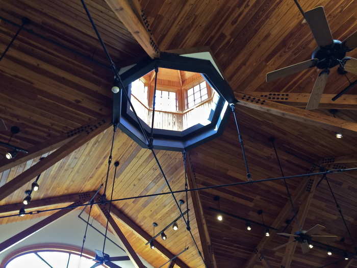 The visitor center feels like a modern log cabin with high wooden ceilings, great natural light, and clean architecture.